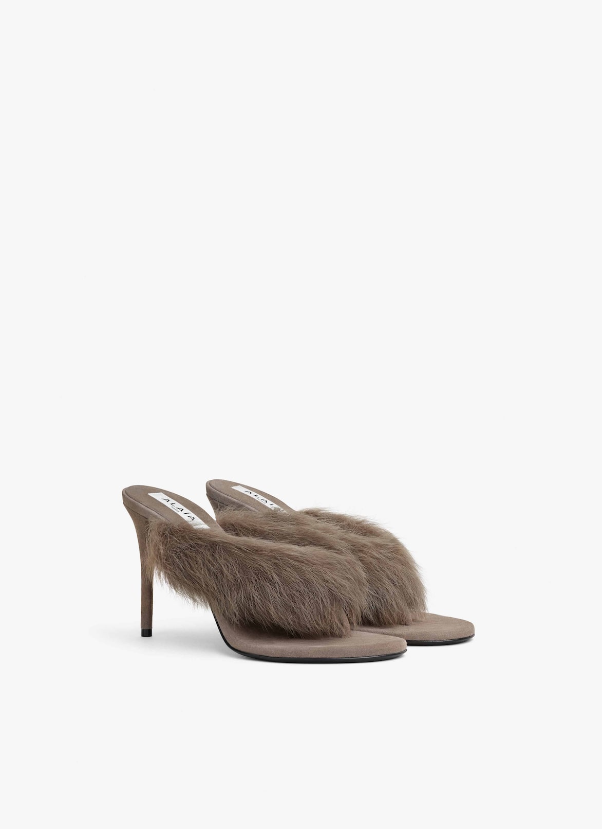 HEEL THONG MULES IN LAMBSKIN ALAÏA TAUPE HEEL THONG MULES IN LAMBSKIN